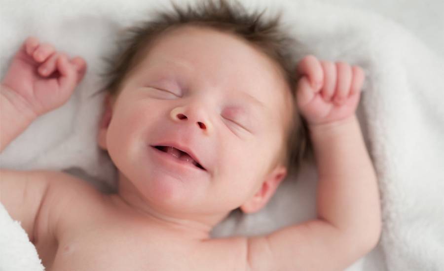 Ребенок улыбается во сне - толкование снов