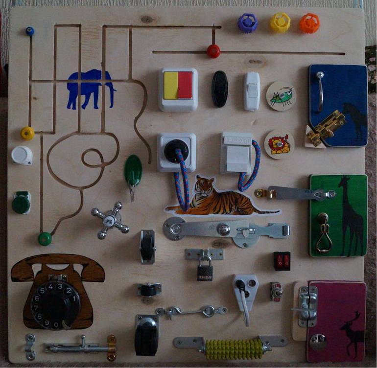 Бизиборд своими руками - развивающая доска с замочками и кнопочками (фото, мастер-класс)